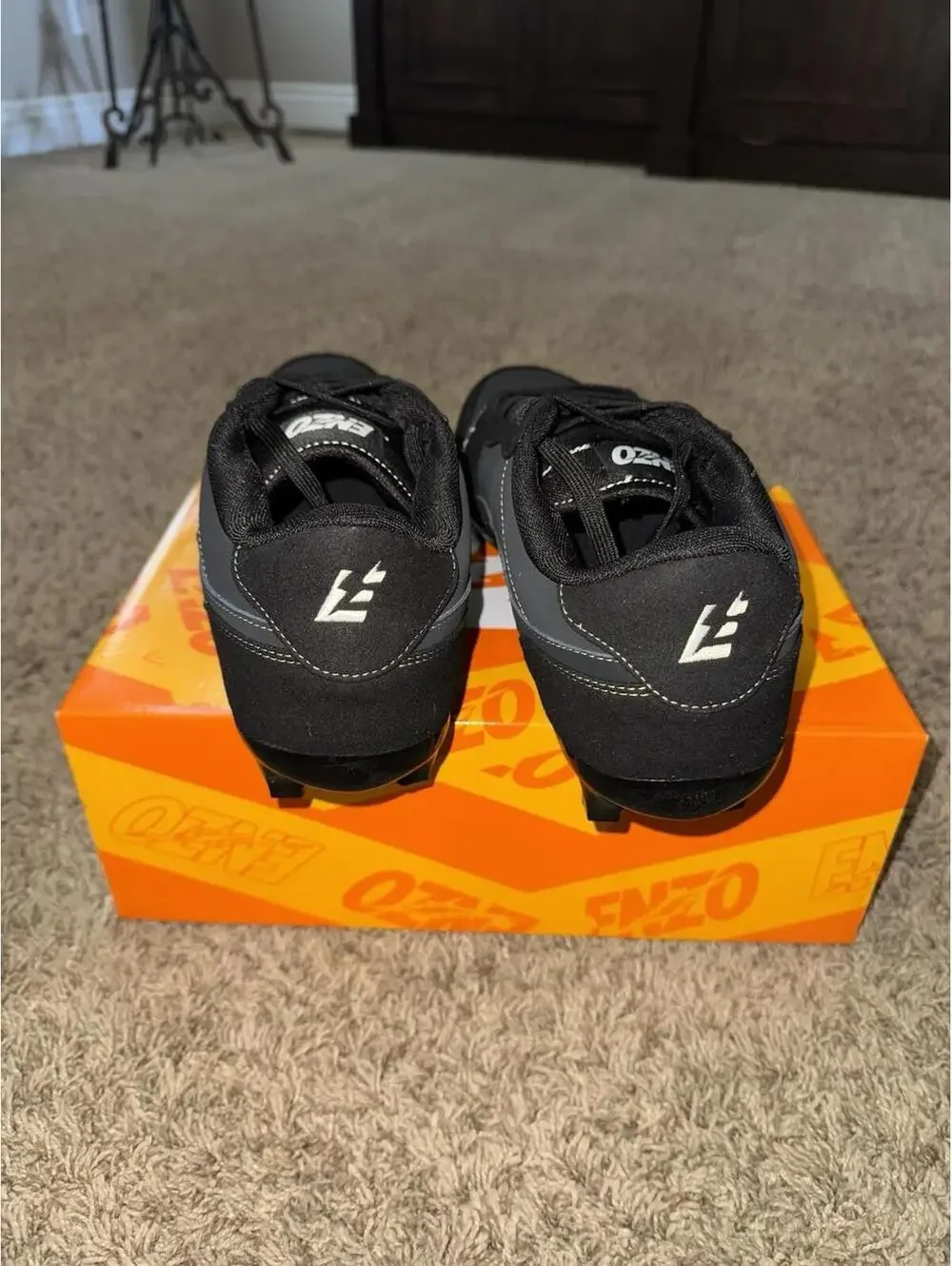 NIB Phantom Black Enzo Cleats.  Size 14 NEW!